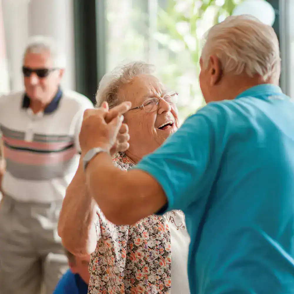Senior Couple dancing at a community get together