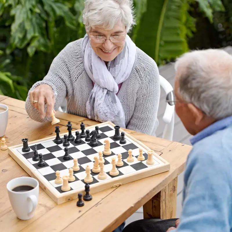 Two seniors playing chess