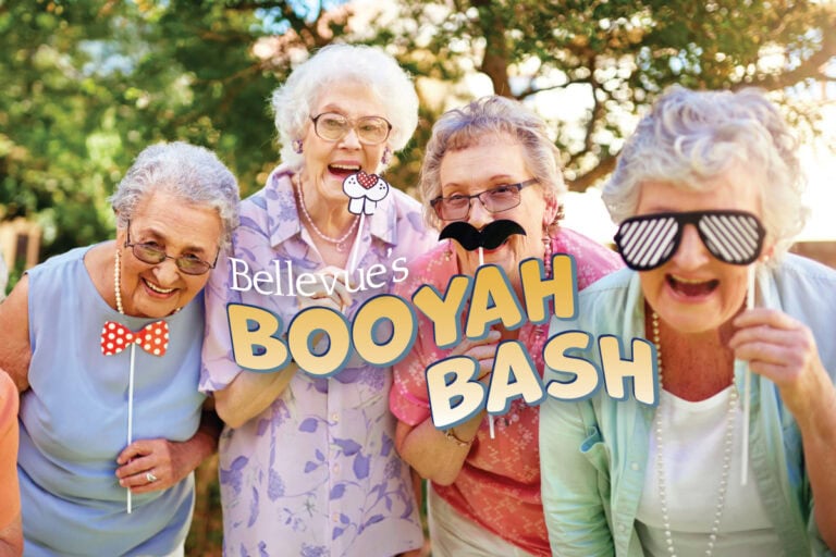 Senior Women with funny photo props at Bellevue Senior living