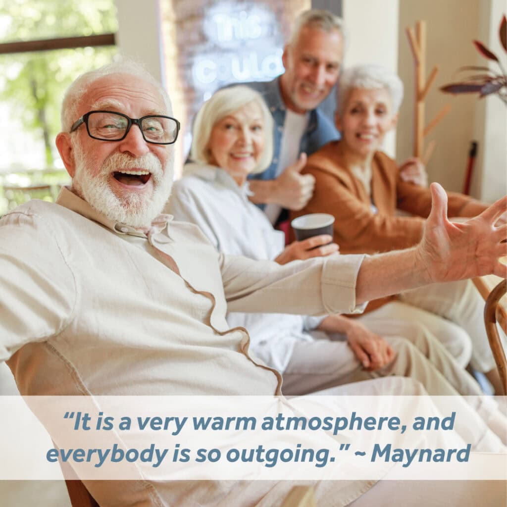 A man in a senior living community having fun with friends